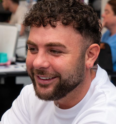 Lee of Aspire Estates working in the office