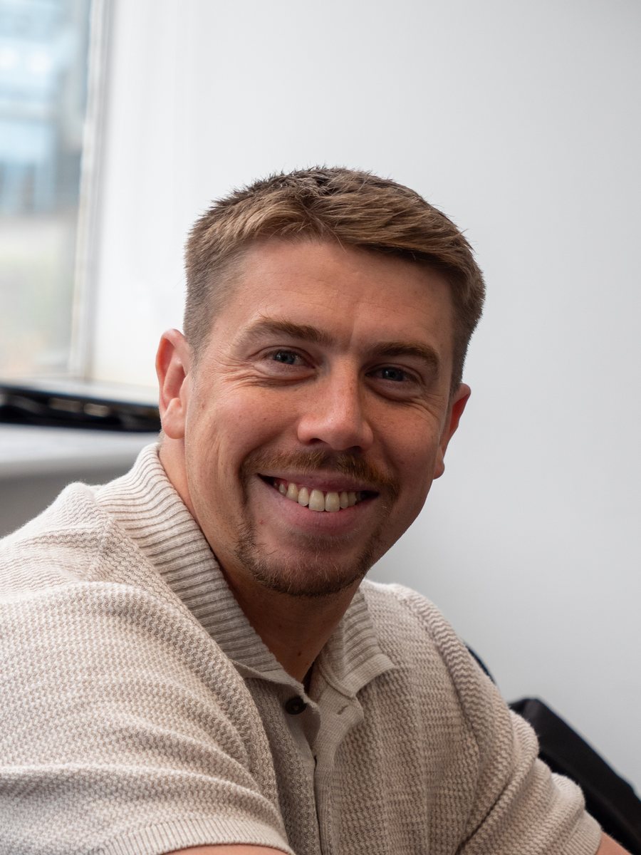 Louis of Aspire Estates, smiling to camera